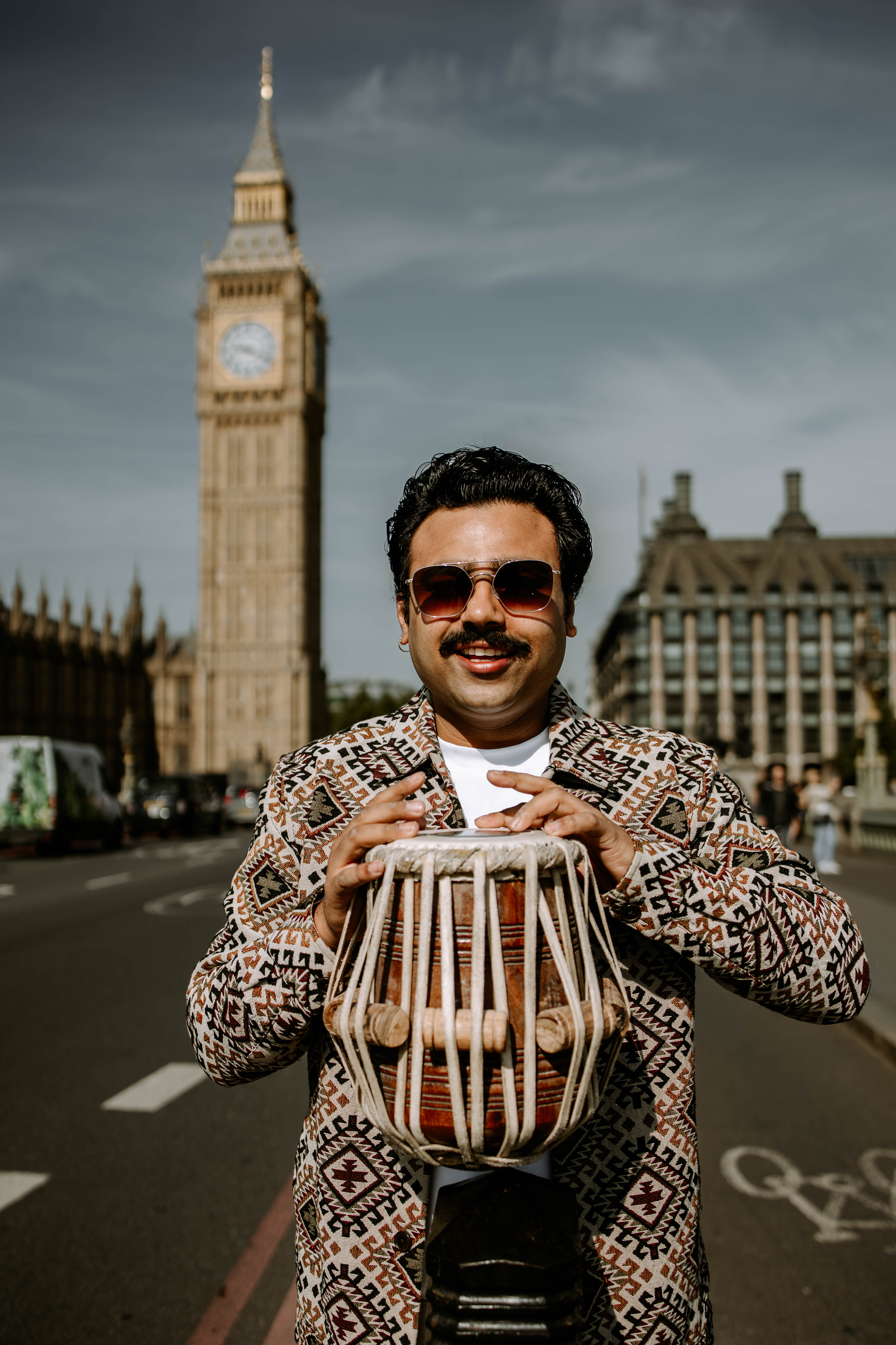 Manmohan Dogra with his tabla by Big Ben, London